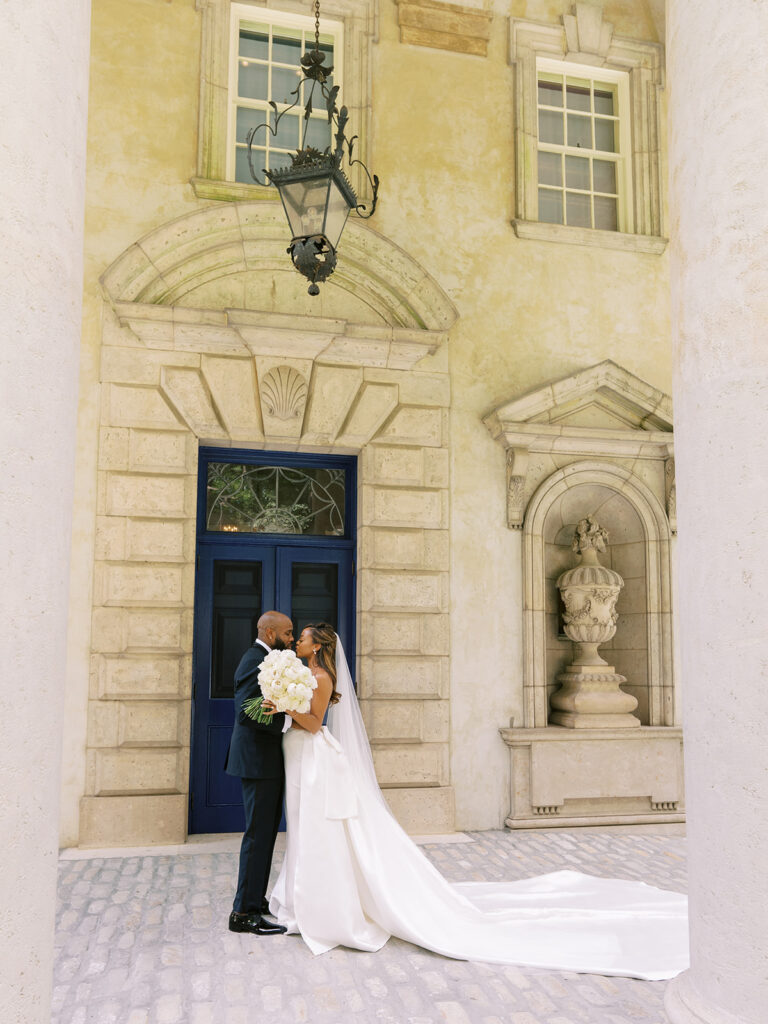 Featured in MunaLuchi Bride Magazine, Issue 28, red and pink florals bloom in this timeless wedding at the Atlanta History Center.