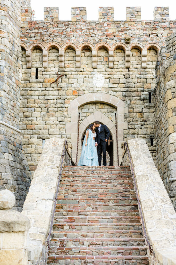 Set against the Castello Di Amorosa in Calistoga, California, this elegant vineyard engagement session is giving Prince and Princess vibes.