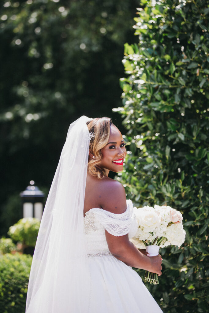 Abigail and Ramon's regal fairytale wedding featured all-white florals, refined decor, and an exquisite venue! 