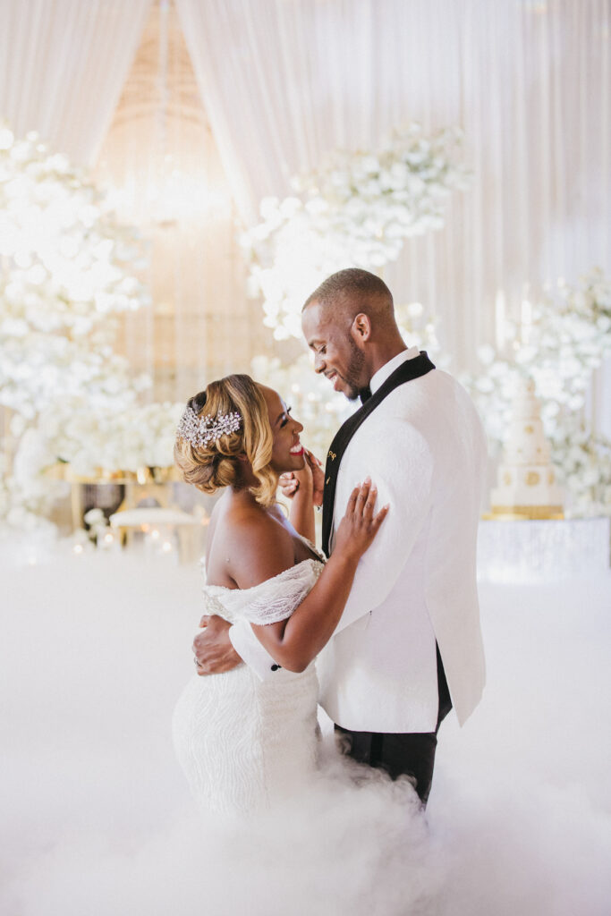 Abigail and Ramon's regal fairytale wedding featured all-white florals, refined decor, and an exquisite venue! 