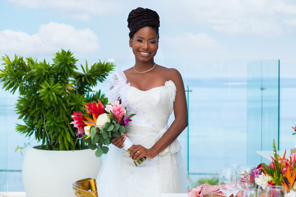 Featured in Issue 28, EbonyCattouse Events & Designer Kosibah created a stunning styled shoot in Belize with Ms. Earth 2021: Destiny Wagner.