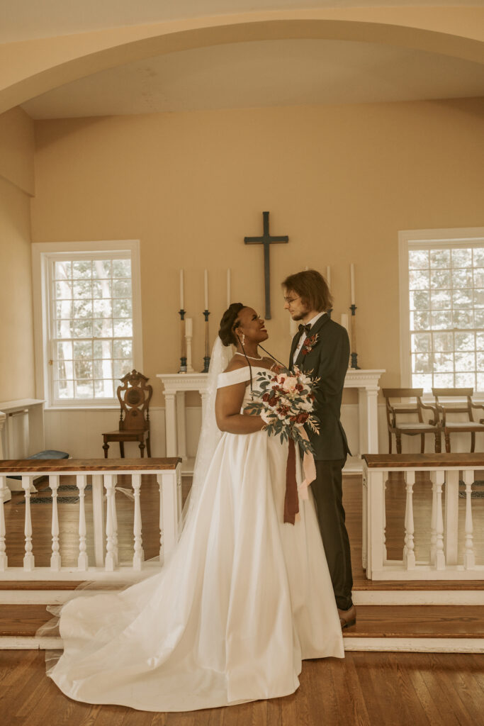 This romantic DIY wedding at the Allaire State Chapel in New Jersey stole our hearts with an intimate couple's photoshoot and barn reception.