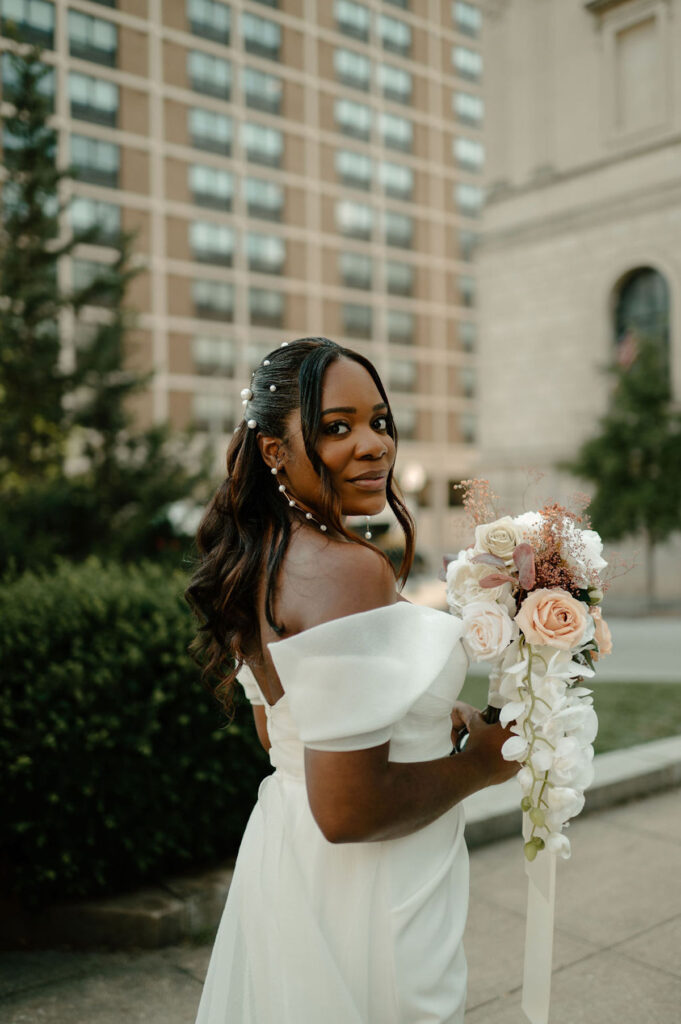 An elegantly chic wedding at the Baltimore Museum of Art captures the essence of true love with touching personal vows & sophisticated attire.