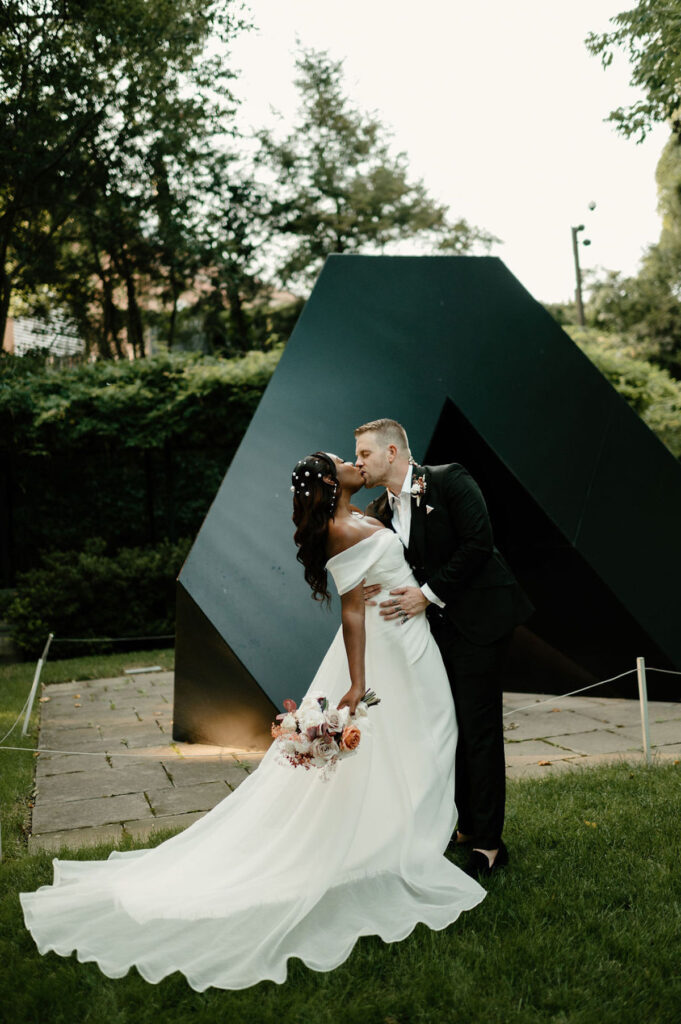 An elegantly chic wedding at the Baltimore Museum of Art captures the essence of true love with touching personal vows & sophisticated attire.