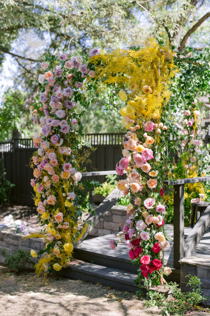 Bursting with colorful summer florals and sweet details, love blooms in this private estate wedding at the bride's grandmother's home in Walnut Creek, California.