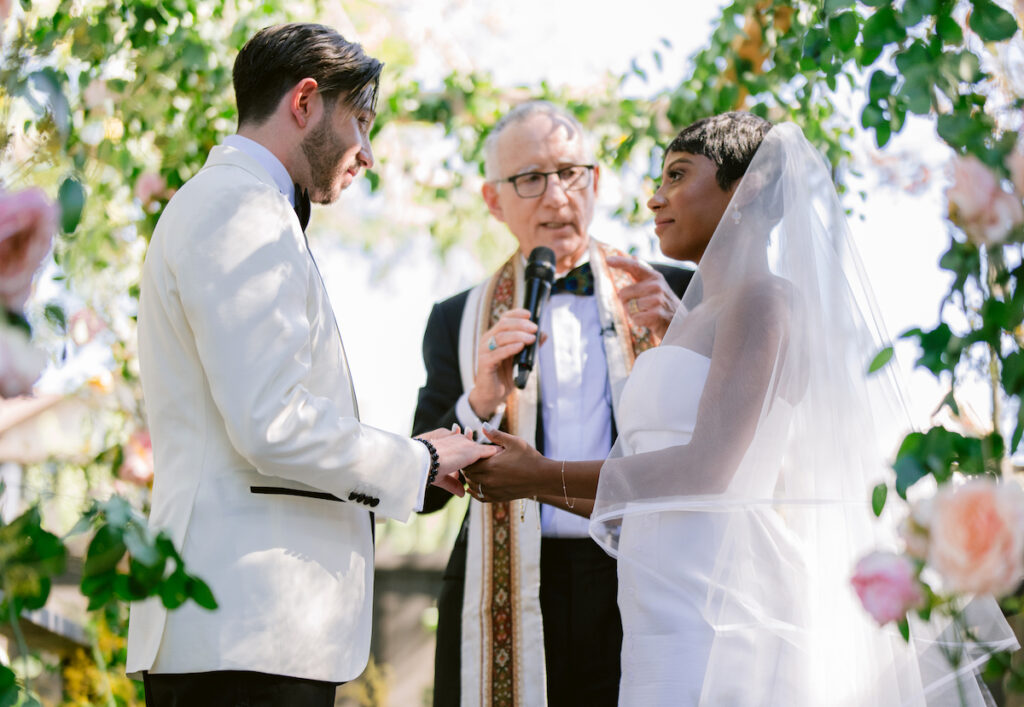 Bursting with colorful summer florals and sweet details, love blooms in this private estate wedding at the bride's grandmother's home in Walnut Creek, California.