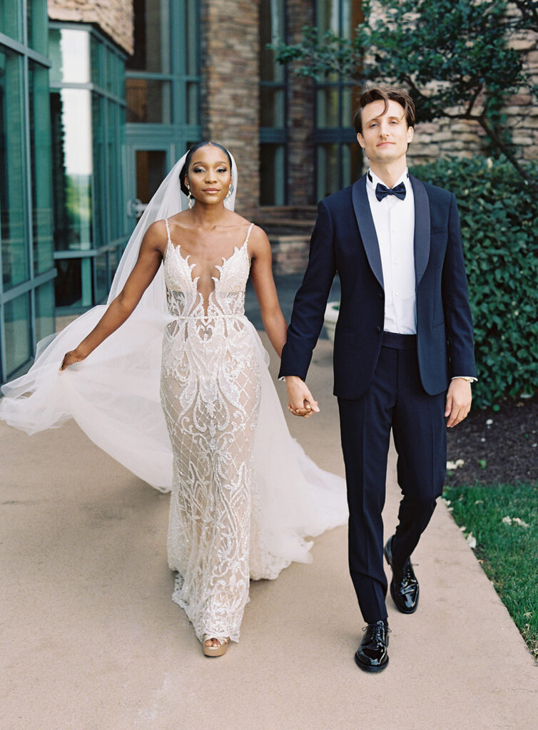 Attorneys say "I Do!" in a romantic outdoor ceremony at the Lansdowne Resort in Leesburg, VA. Featuring classy decor, gold details, and a gorgeous custom gown by Berta Bridal. 