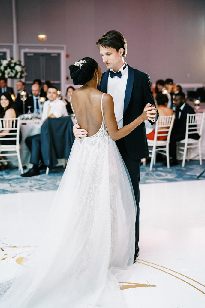 Attorneys say "I Do!" in a romantic outdoor ceremony at the Lansdowne Resort in Leesburg, VA. Featuring classy decor, gold details, and a gorgeous custom gown by Berta Bridal. 