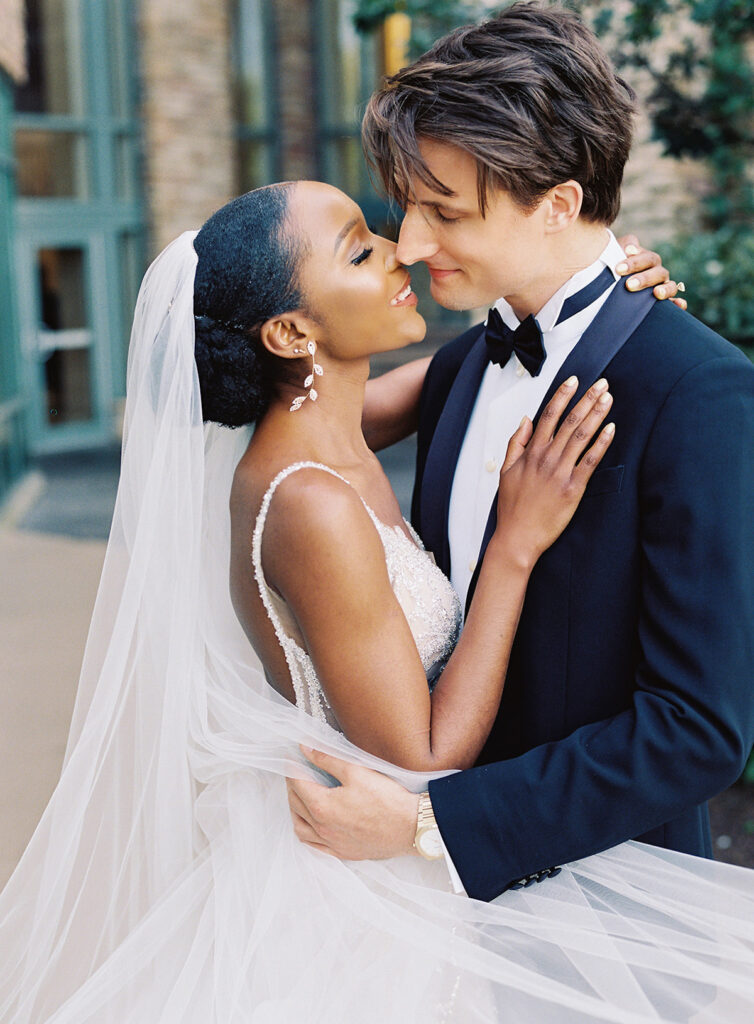 Attorneys say "I Do!" in a romantic outdoor ceremony at the Lansdowne Resort in Leesburg, VA. Featuring classy decor, gold details, and a gorgeous custom gown by Berta Bridal. 