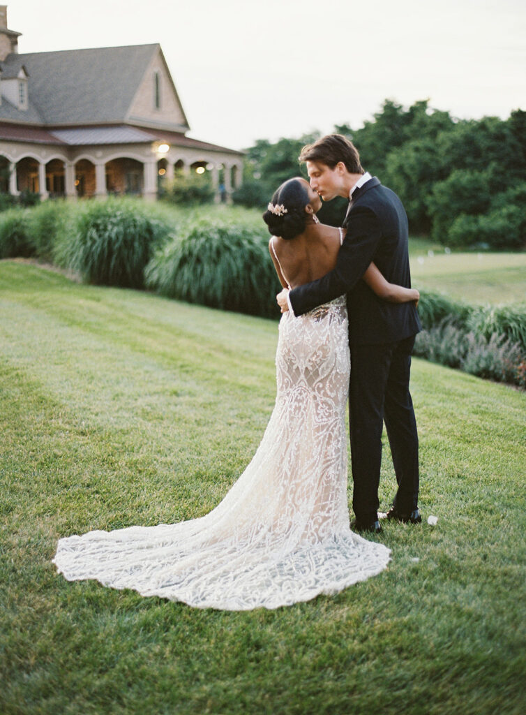 Attorneys say "I Do!" in a romantic outdoor ceremony at the Lansdowne Resort in Leesburg, VA. Featuring classy decor, gold details, and a gorgeous custom gown by Berta Bridal. 