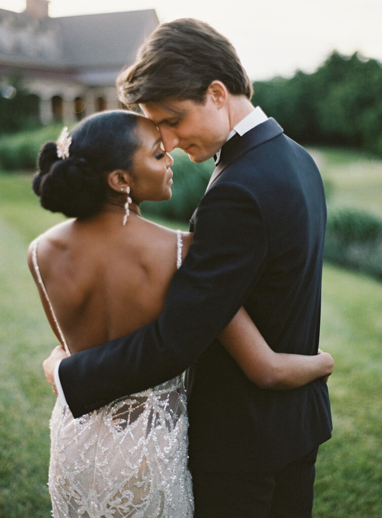 Attorneys say "I Do!" in a romantic outdoor ceremony at the Lansdowne Resort in Leesburg, VA. Featuring classy decor, gold details, and a gorgeous custom gown by Berta Bridal. 