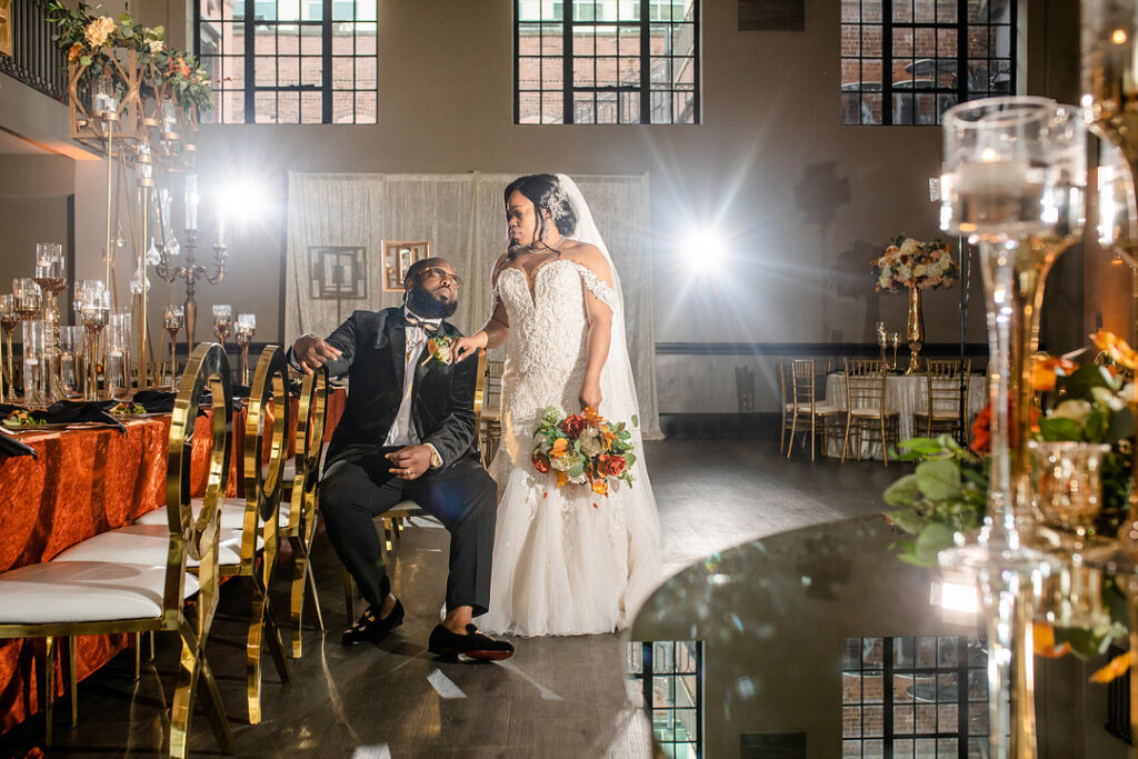 Military couple weds in a classy and timeless ceremony at 1208 Washington Place in Columbia, SC, with autumnal hues and historic charm. 