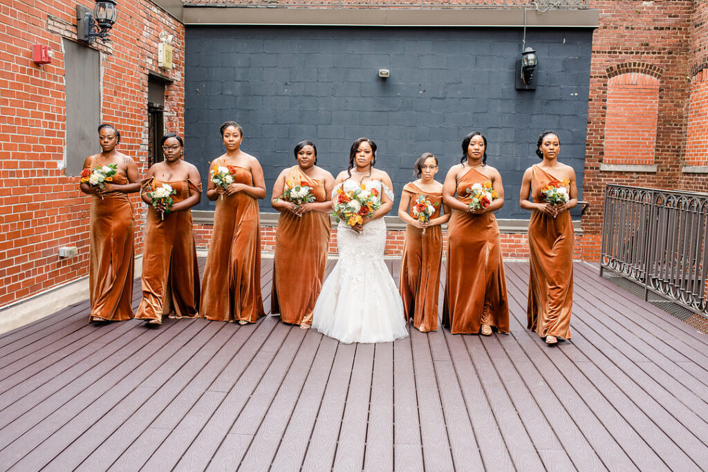 Military couple weds in a classy and timeless ceremony at 1208 Washington Place in Columbia, SC, with autumnal hues and historic charm. 