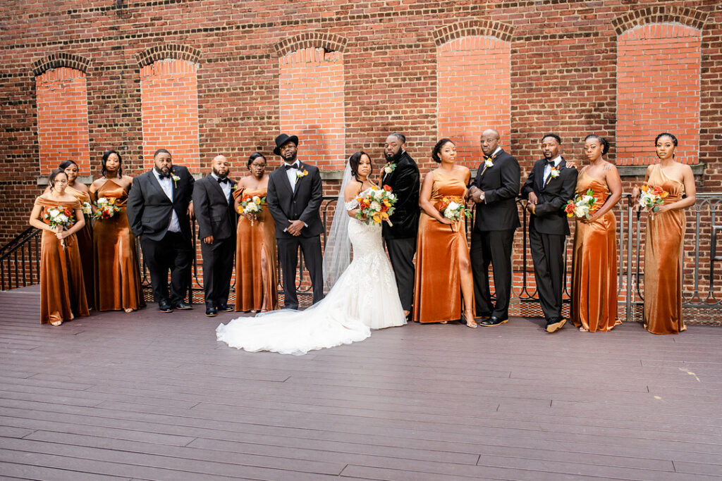 Military couple weds in a classy and timeless ceremony at 1208 Washington Place in Columbia, SC, with autumnal hues and historic charm. 