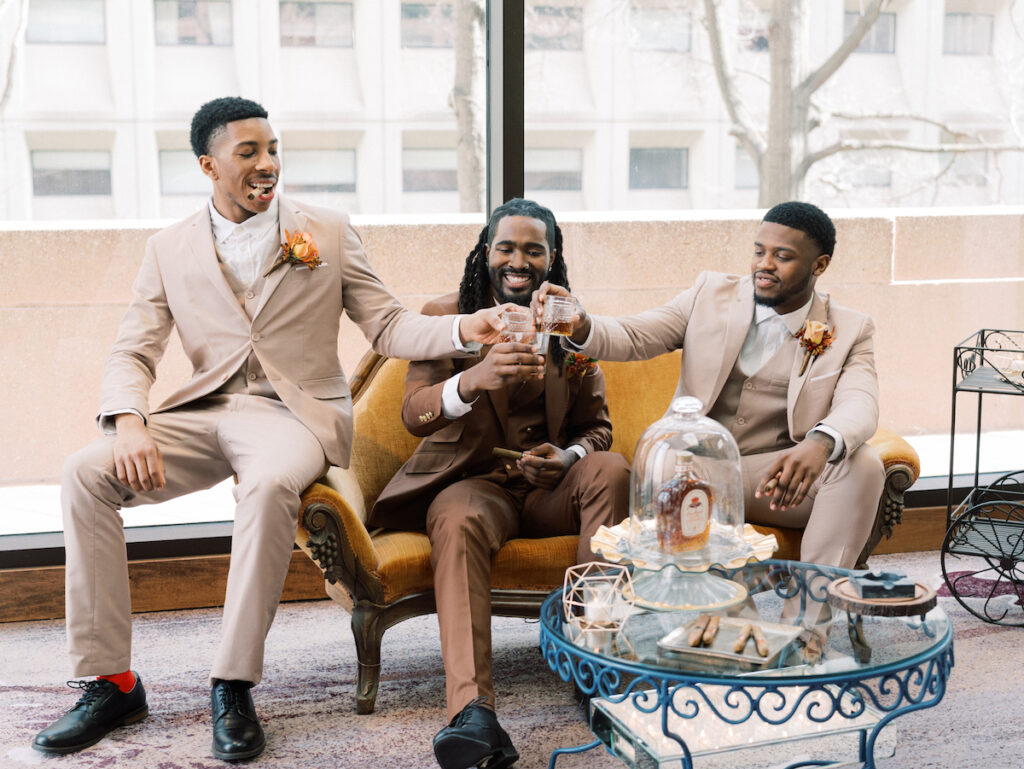 Focusing on the perspective of the groom, this unique cigar and whiskey-styled shoot captures masculine elegance!