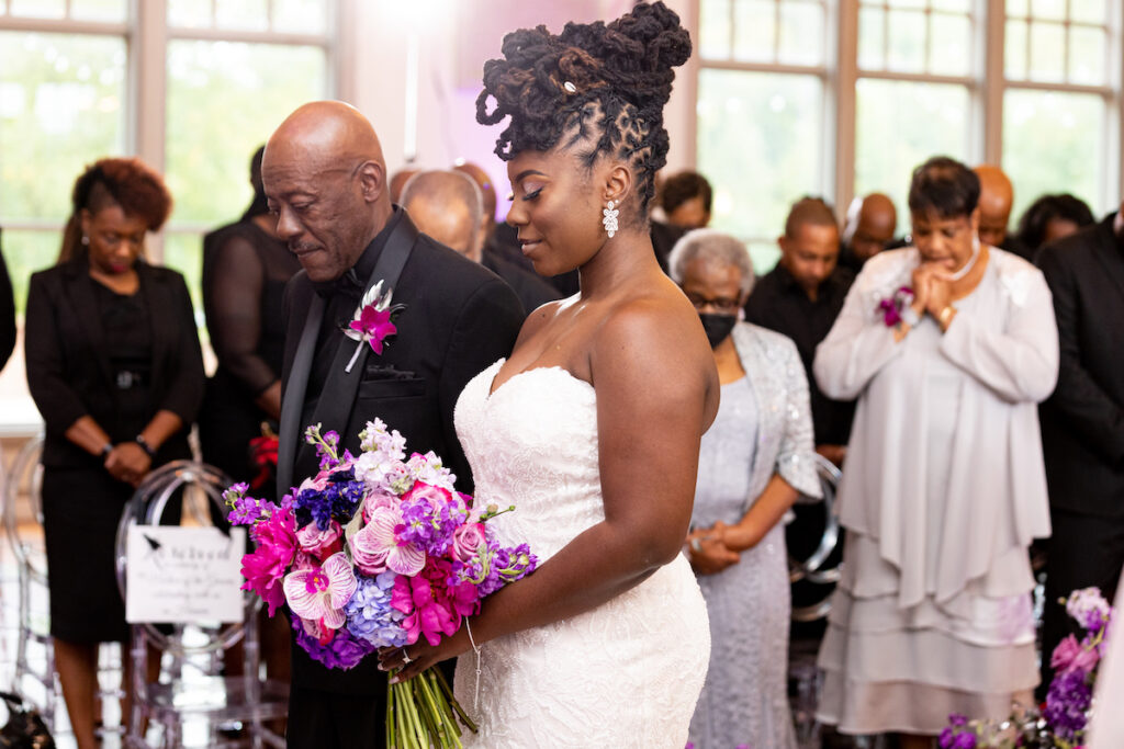 The Wooten's Rip The Runway-Themed wedding in North Carolina serves looks and love with colorful berry-hued florals and modern decor!