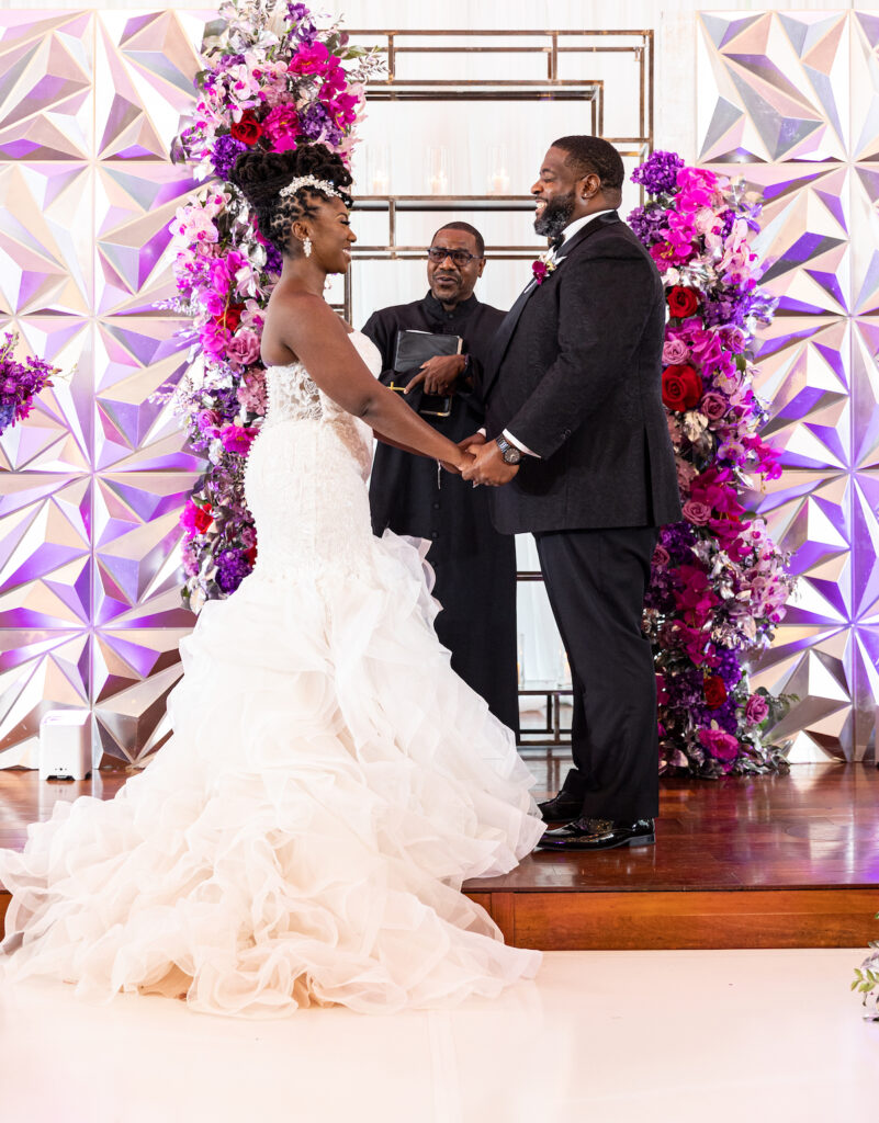 The Wooten's Rip The Runway-Themed wedding in North Carolina serves looks and love with colorful berry-hued florals and modern decor!