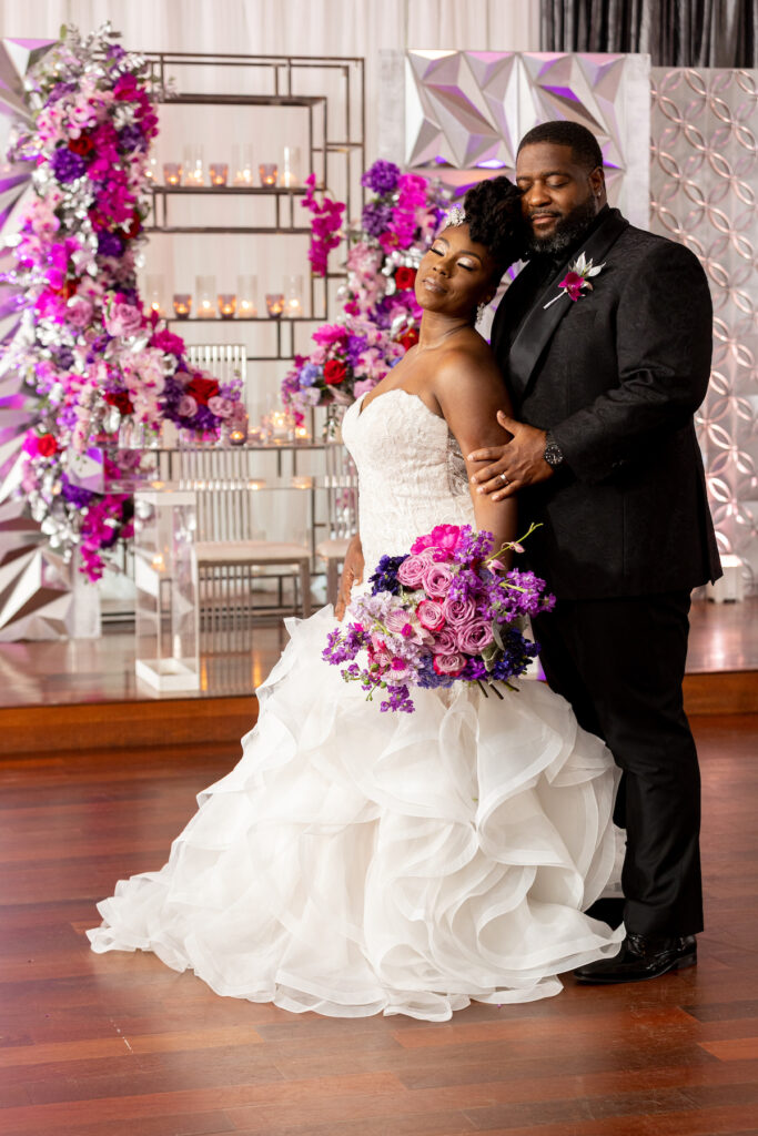 The Wooten's Rip The Runway-Themed wedding in North Carolina serves looks and love with colorful berry-hued florals and modern decor!