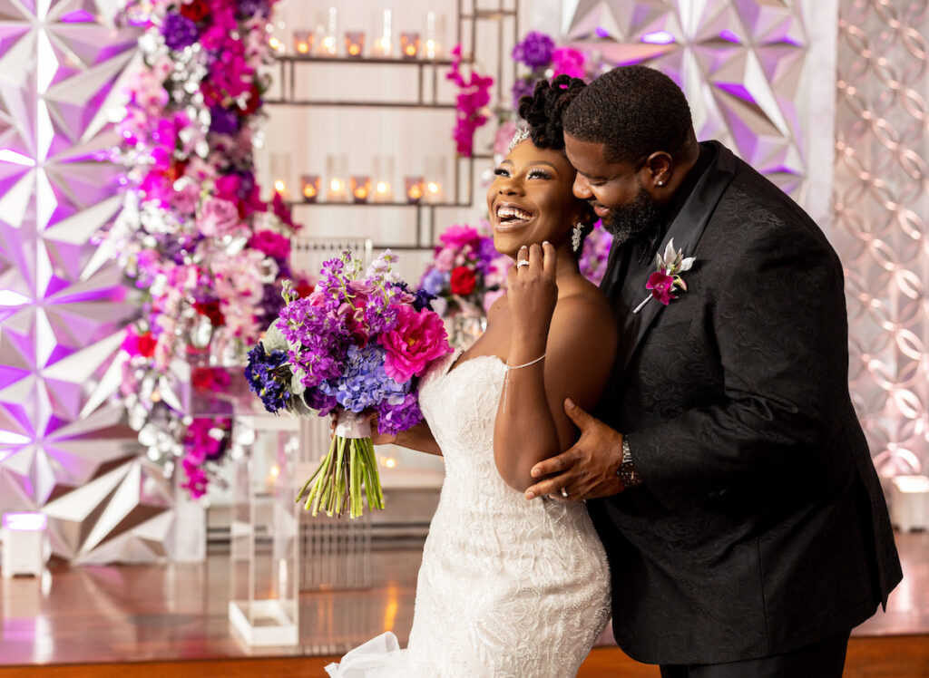 The Wooten's Rip The Runway-Themed wedding in North Carolina serves looks and love with colorful berry-hued florals and modern decor!