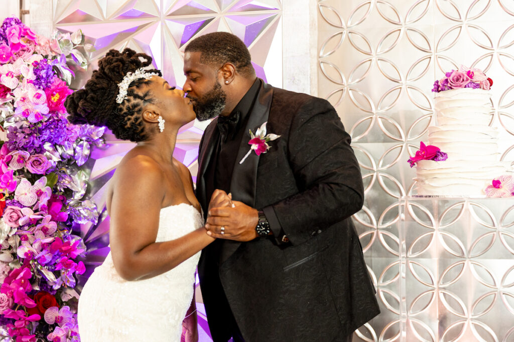 The Wooten's Rip The Runway-Themed wedding in North Carolina serves looks and love with colorful berry-hued florals and modern decor!