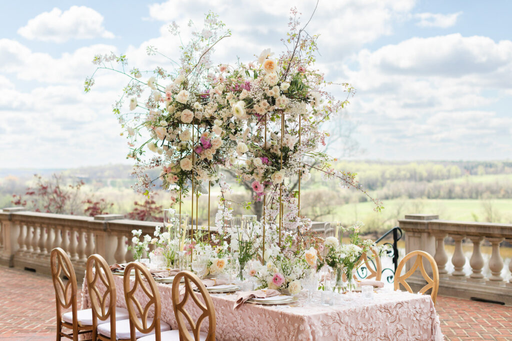 The regal Estate at River Run hosts this delicate spring-styled shoot with romantic details and a soft, springtime palette.