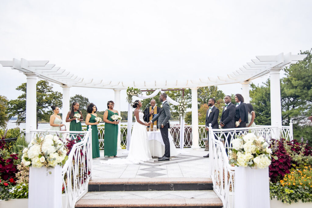 The bride's puff sleeve dress stars in this modern and elegant outdoor wedding ceremony at the VIP Country Club in New Rochelle, New York!