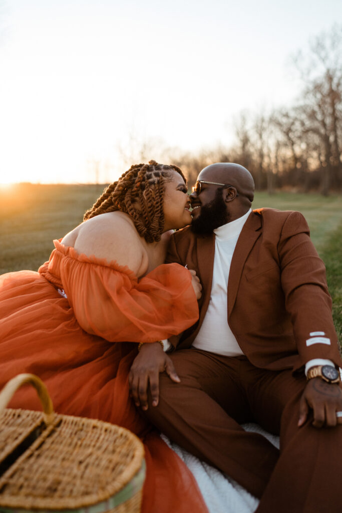 Featured in Issue 29, Honey Lens Imaging captures Adiah and AJ's romantic fall picnic engagement shoot at the Sixpence with rich autumn hues.