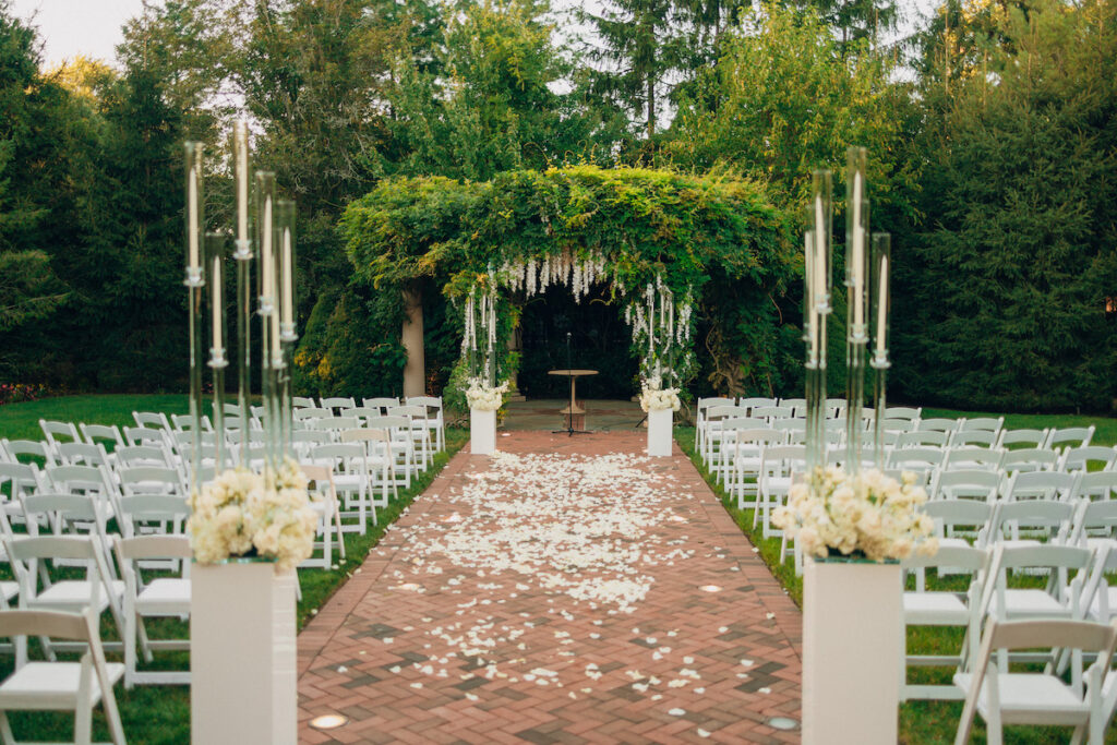 Arielle and Jamari's black-tie wedding affair featured romantic fashion with a dramatic flare and classic white and gold decor!