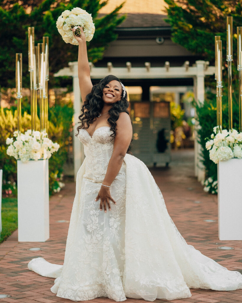 Arielle and Jamari's black-tie wedding affair featured romantic fashion with a dramatic flare and classic white and gold decor!