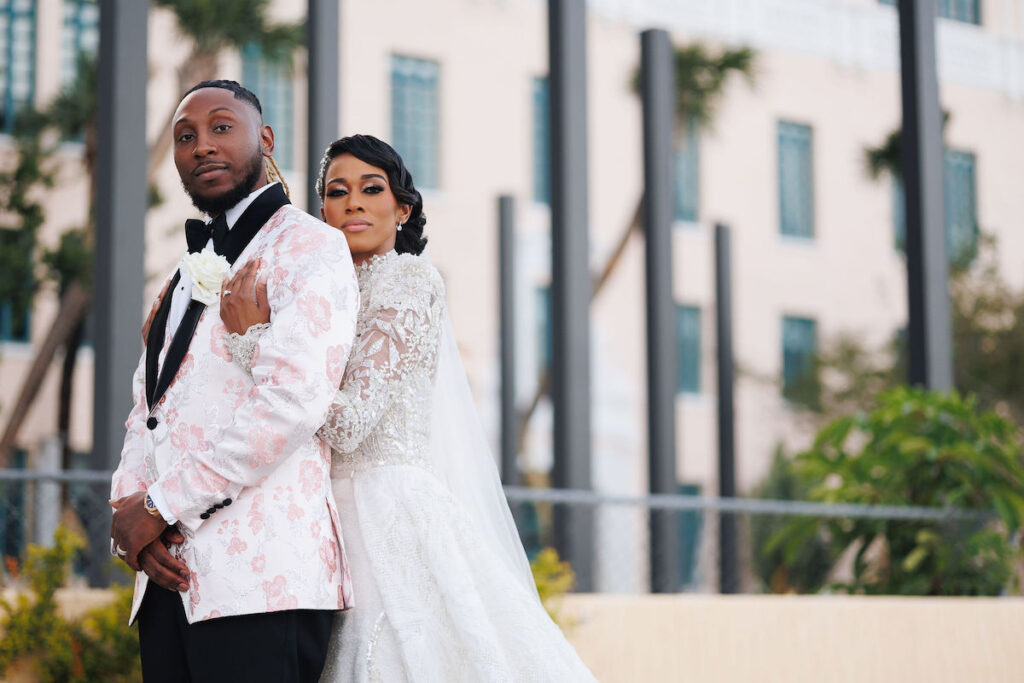 This luxury wedding at Briza on the Bay in Miami, Florida, features two glamorous outfits by the bride and groom and an intimate first look.