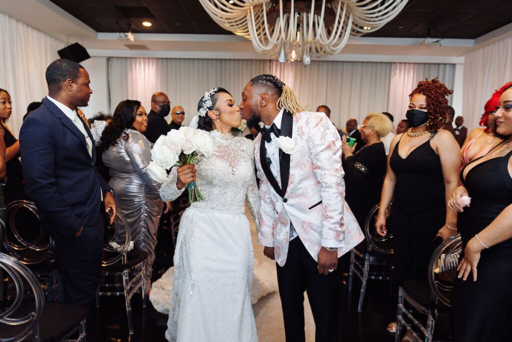 This luxury wedding at Briza on the Bay in Miami, Florida, features two glamorous outfits by the bride and groom and an intimate first look.