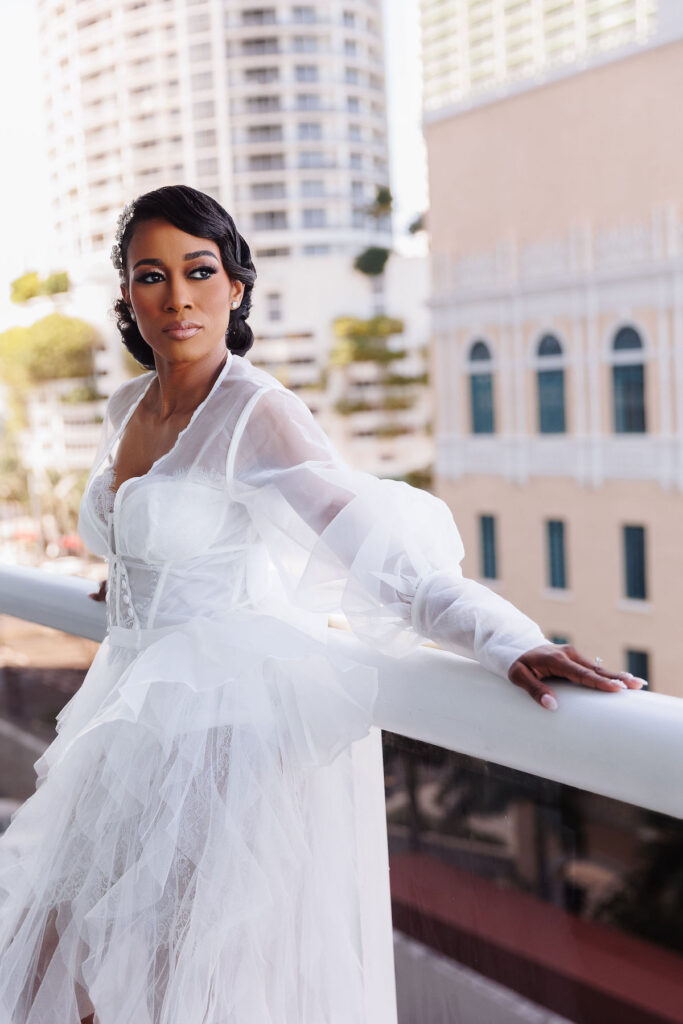 This luxury wedding at Briza on the Bay in Miami, Florida, features two glamorous outfits by the bride and groom and an intimate first look.