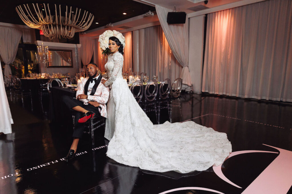 This luxury wedding at Briza on the Bay in Miami, Florida, features two glamorous outfits by the bride and groom and an intimate first look.