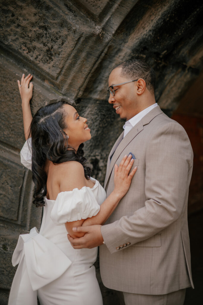 Morin and Caron's timeless spring e-session features elegant style, fully bloomed cherry blossoms, and the iconic scenery of Central Park!