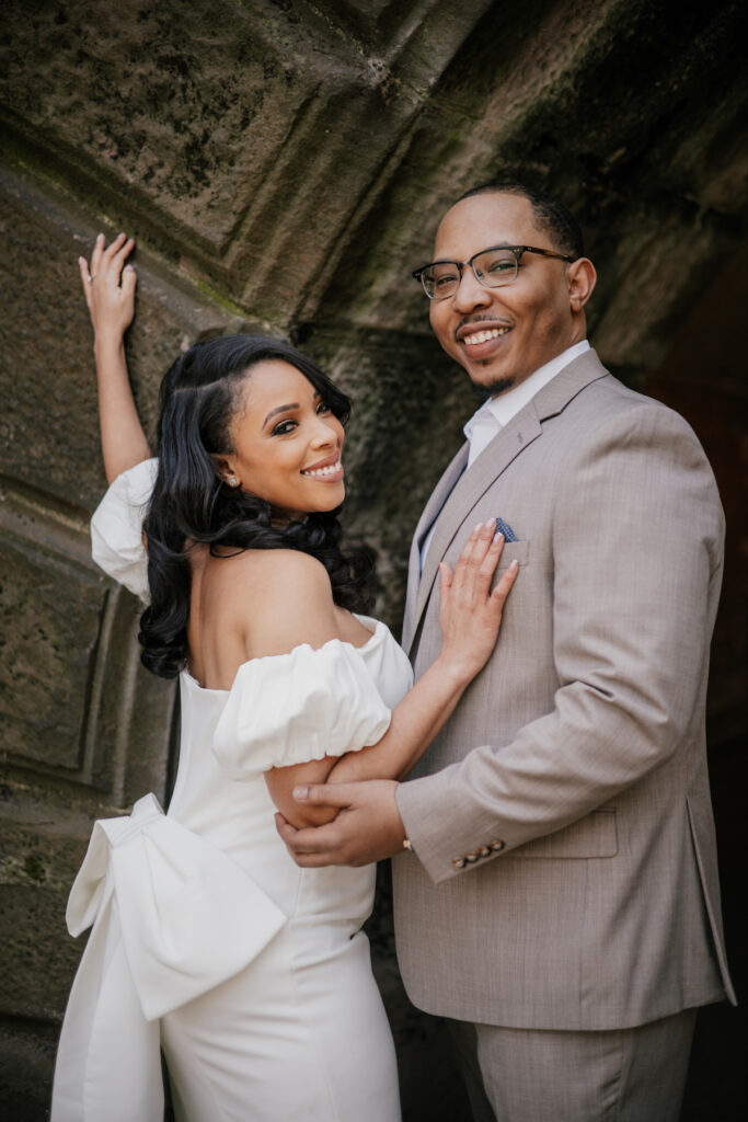 Morin and Caron's timeless spring e-session features elegant style, fully bloomed cherry blossoms, and the iconic scenery of Central Park!