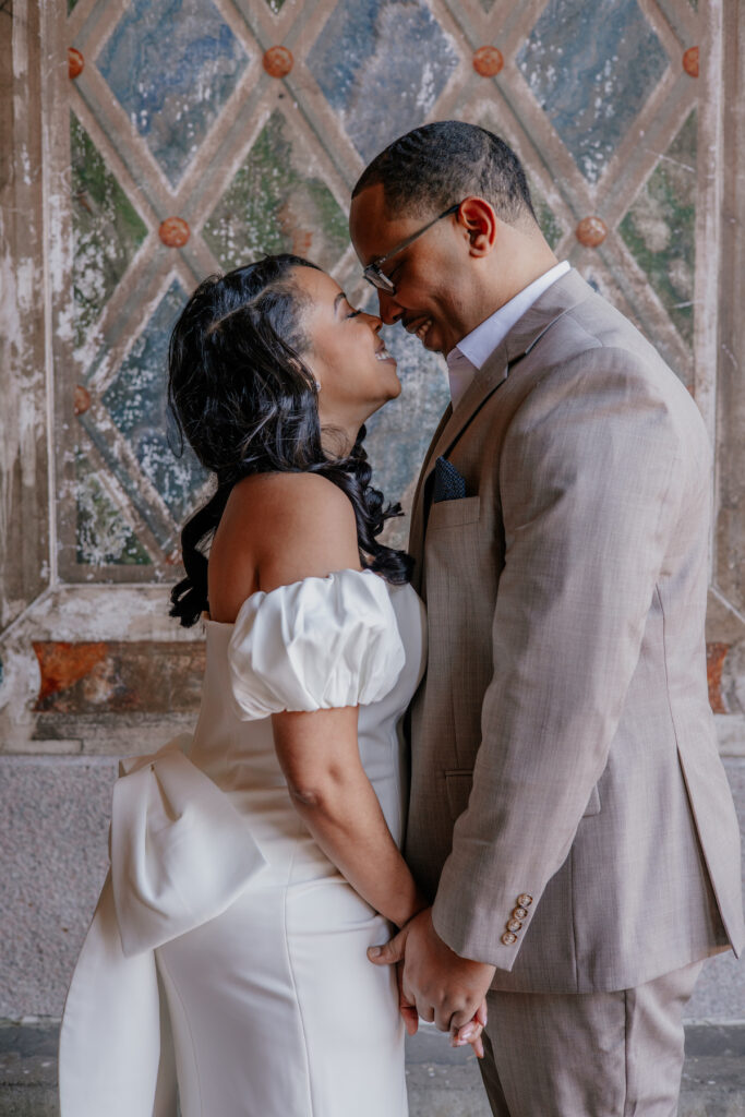 Morin and Caron's timeless spring e-session features elegant style, fully bloomed cherry blossoms, and the iconic scenery of Central Park!