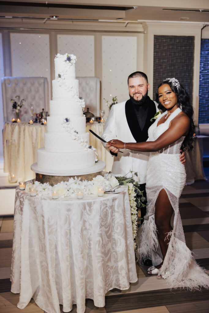 Olivia and Mauricio hosted an elegant and angelic wedding at Russo's on the Bay with a STUNNING Pantora Bridal gown and white tux by Garçon Couture.