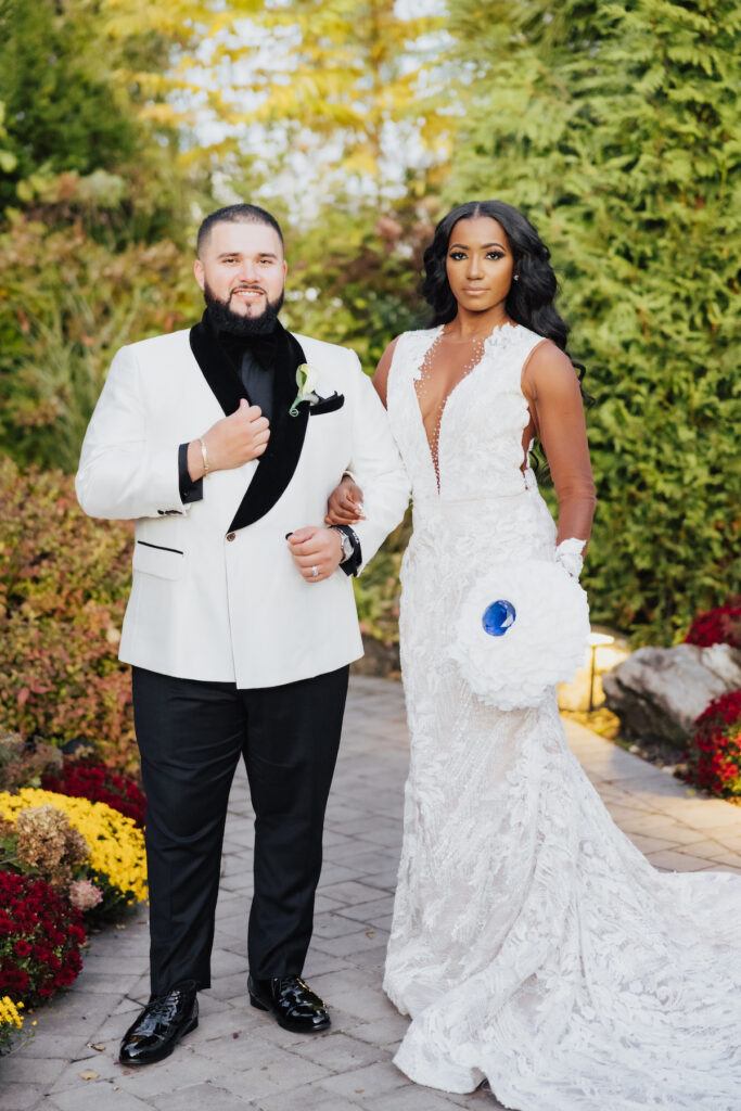 Olivia and Mauricio hosted an elegant and angelic wedding at Russo's on the Bay with a STUNNING Pantora Bridal gown and white tux by Garçon Couture.