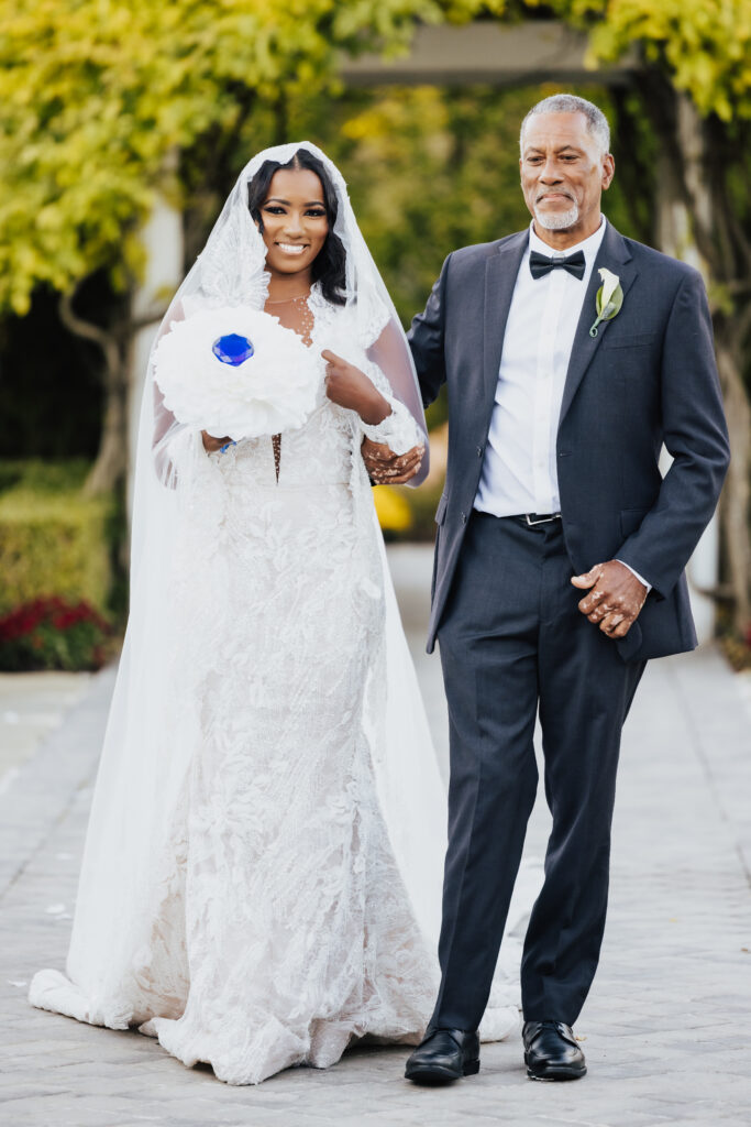 Olivia and Mauricio hosted an elegant and angelic wedding at Russo's on the Bay with a STUNNING Pantora Bridal gown and white tux by Garçon Couture.