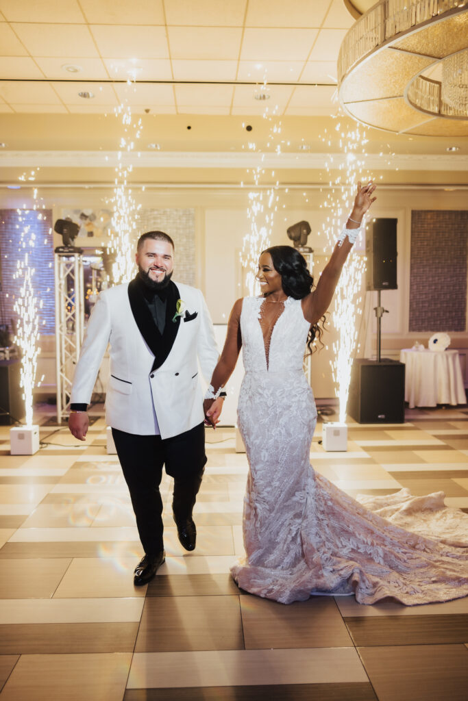 Olivia and Mauricio hosted an elegant and angelic wedding at Russo's on the Bay with a STUNNING Pantora Bridal gown and white tux by Garçon Couture.