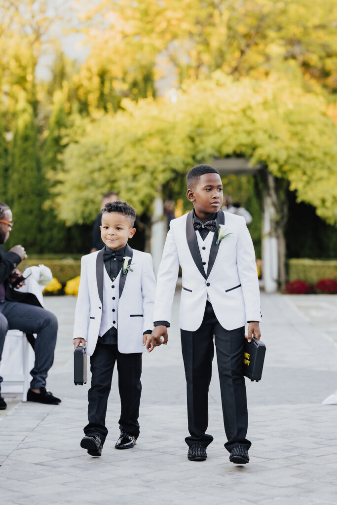 Olivia and Mauricio hosted an elegant and angelic wedding at Russo's on the Bay with a STUNNING Pantora Bridal gown and white tux by Garçon Couture.