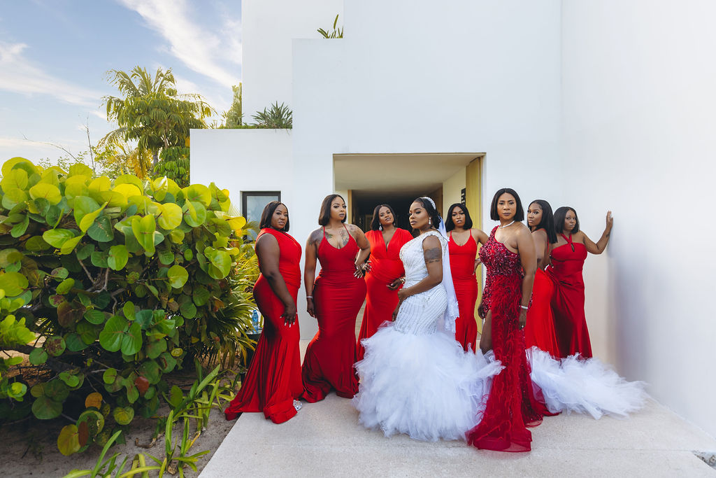 Beautiful brides say “I Do!” in a traditional and elegant destination wedding at the Finest Playa Mujeres in Mexico with lux florals & decor!