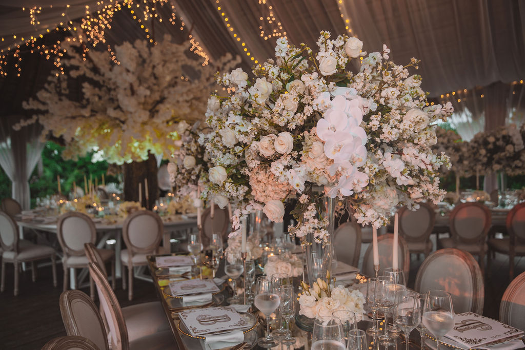 Beautiful brides say “I Do!” in a traditional and elegant destination wedding at the Finest Playa Mujeres in Mexico with lux florals & decor!