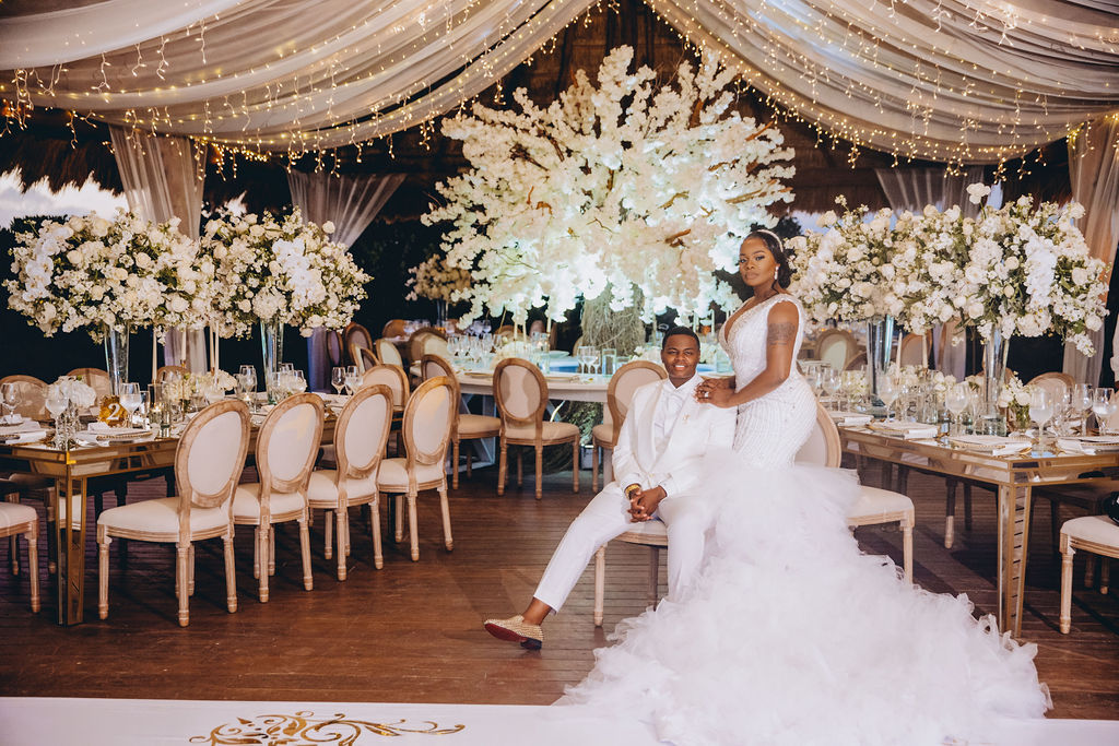 Beautiful brides say “I Do!” in a traditional and elegant destination wedding at the Finest Playa Mujeres in Mexico with lux florals & decor!