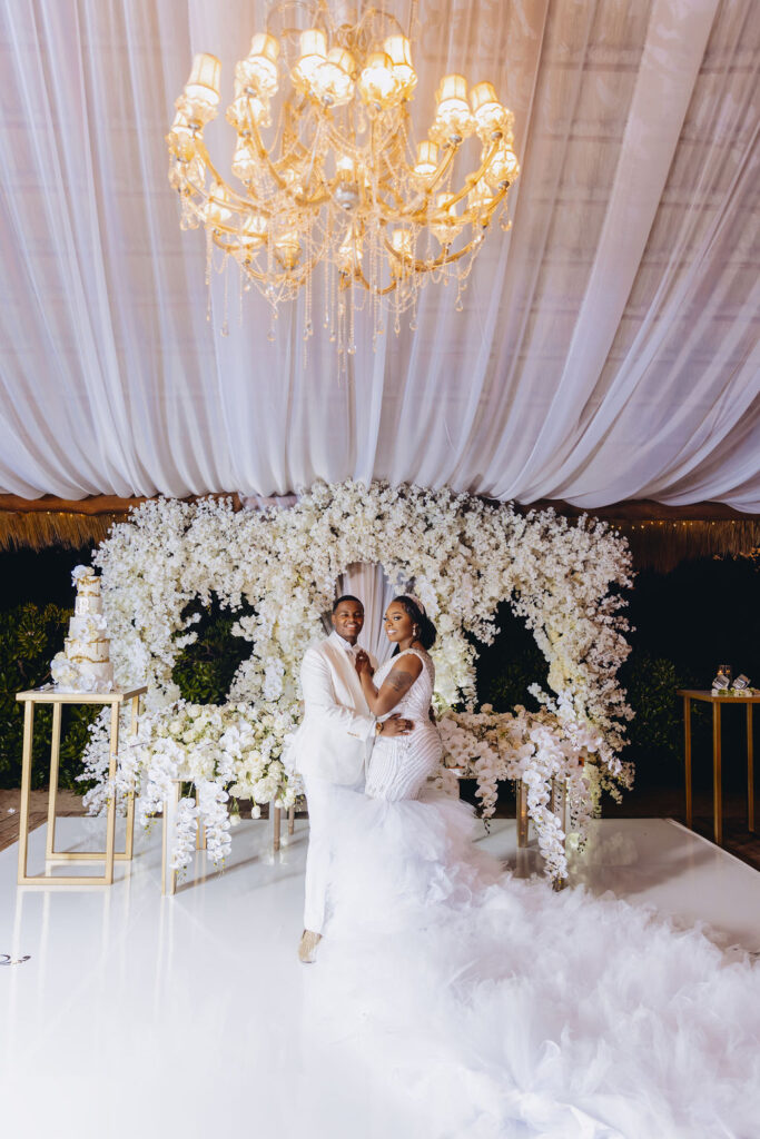 Beautiful brides say “I Do!” in a traditional and elegant destination wedding at the Finest Playa Mujeres in Mexico with lux florals & decor!