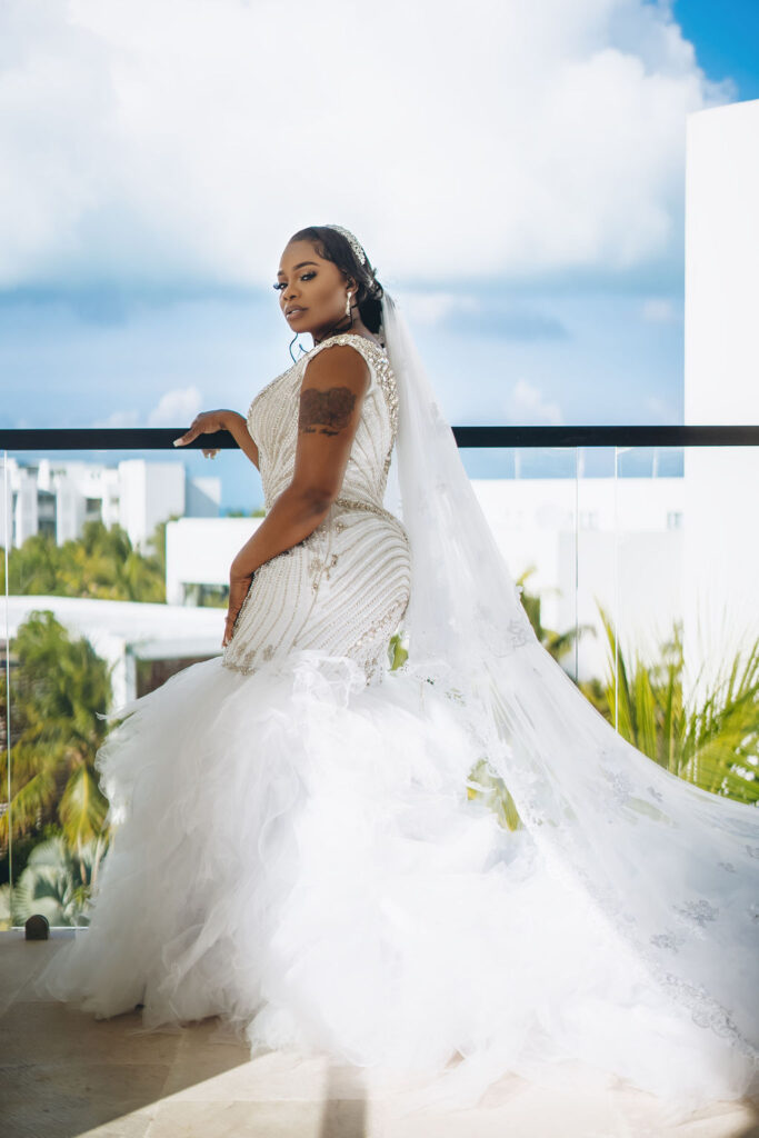 Beautiful brides say “I Do!” in a traditional and elegant destination wedding at the Finest Playa Mujeres in Mexico with lux florals & decor!