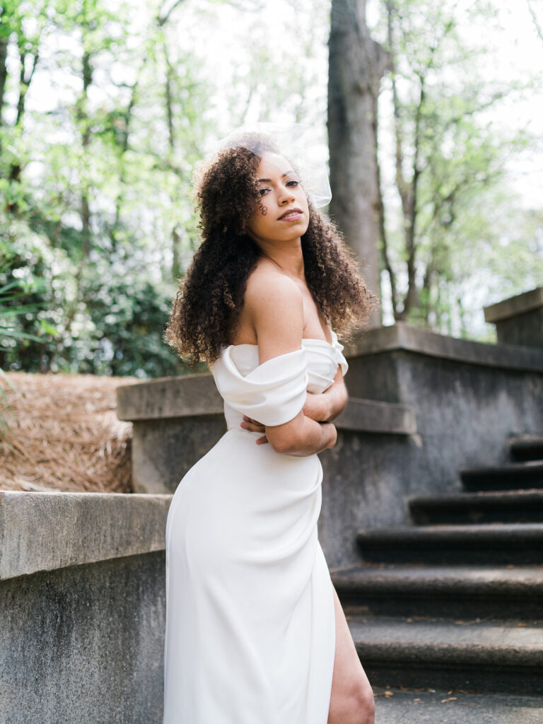 Inspired by the fresh feeling summer brings and the color yellow, this modern summer-styled shoot at the Swan House Atlanta History Center features a contemporary tablescape and decor with romantic touches and three fashion-forward bridal looks! 