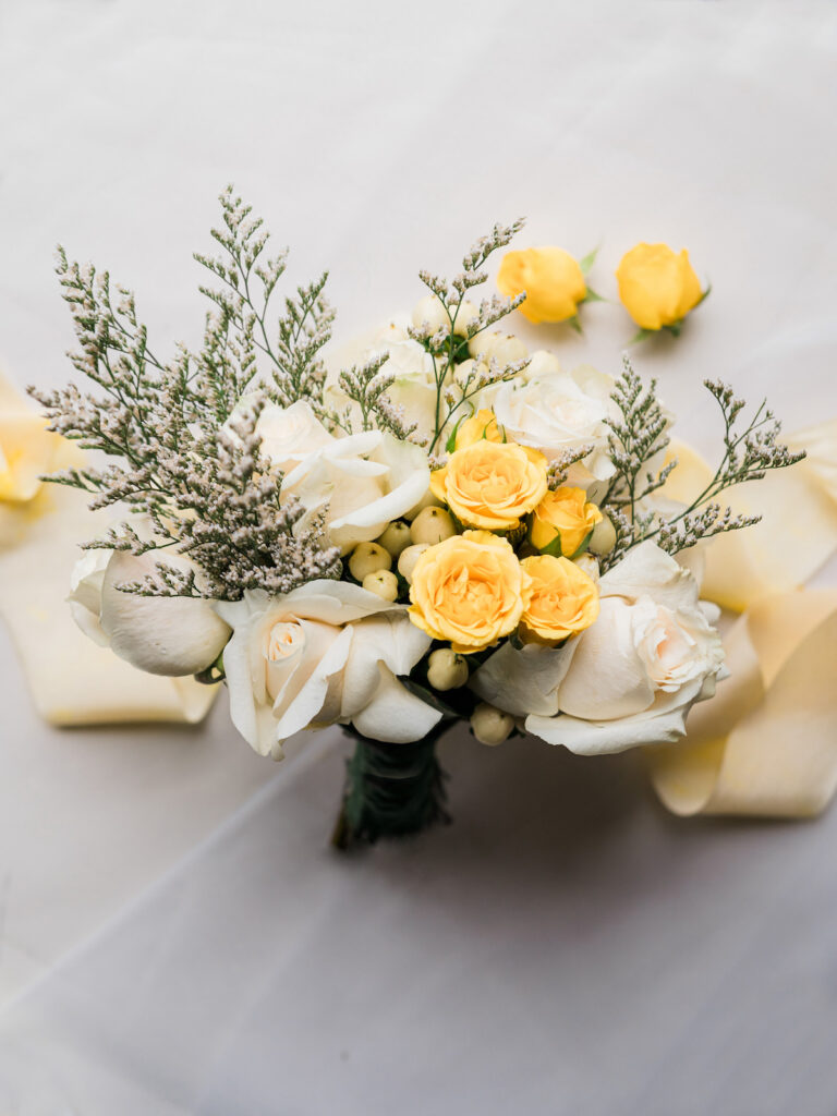 Inspired by the fresh feeling summer brings and the color yellow, this modern summer-styled shoot at the Swan House Atlanta History Center features a contemporary tablescape and decor with romantic touches and three fashion-forward bridal looks! 