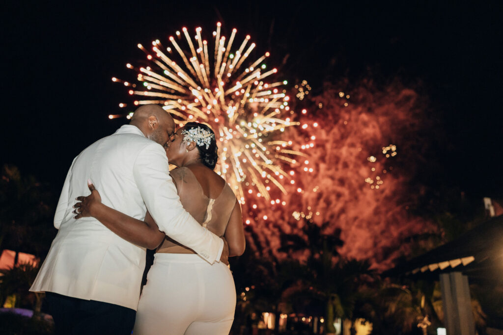 We're giving you something to talk about with Tiffany and Dane's ultra-luxe destination wedding by the beach in Jamaica! Their wedding was first featured in Issue 29!