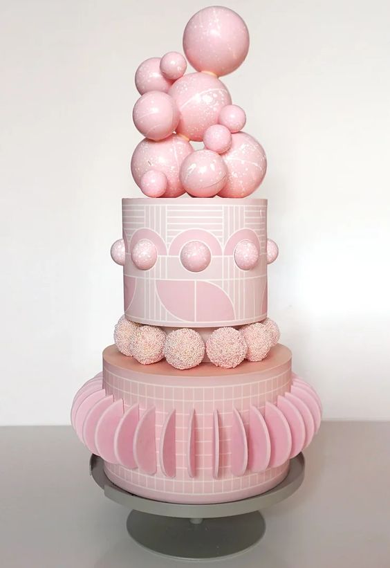 We want pink everything! Our pink wedding cake edit will have you officially wanting to say yes more Barbiecore!